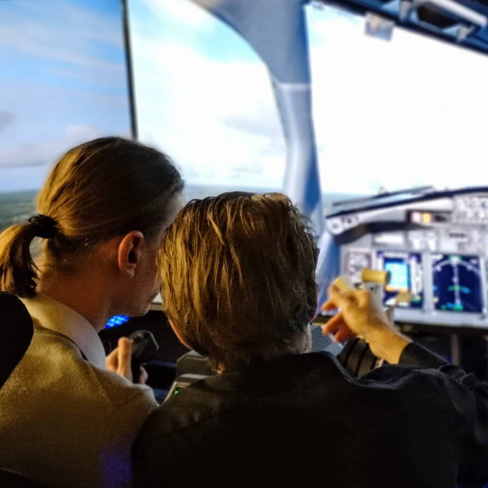 RoarFun presents Lufthansa flight simulator with motion at company Christmas party taking of and landing in Frankfurt.