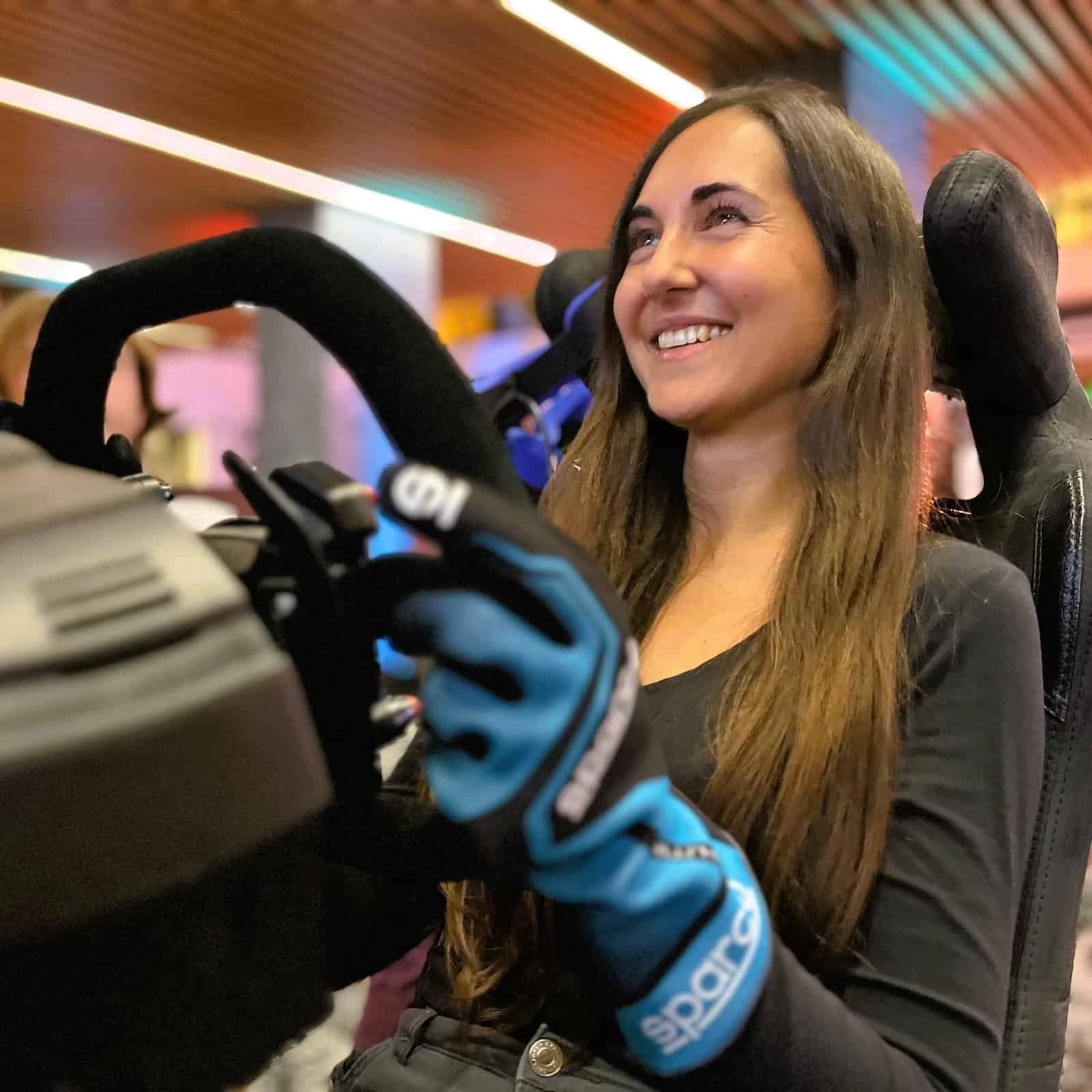 RoarFun Clients Porsche happy girl immersive VR motion racing simulators at Porsche sales event