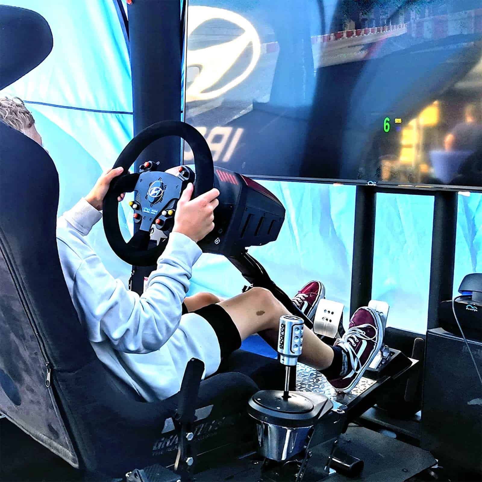 RoarFun Clients Hyundai immersive motion WRC VR rally simulator entertainment on Hyundai Road Show customer days with kids