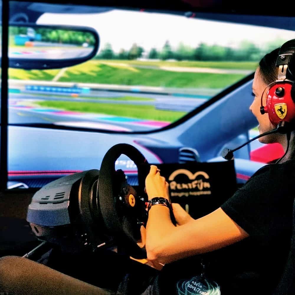 Ferrari happy lady licensed headphones and ferrari steering wheel for the Semrush SEO RoarFun Clients motion racing simulator
