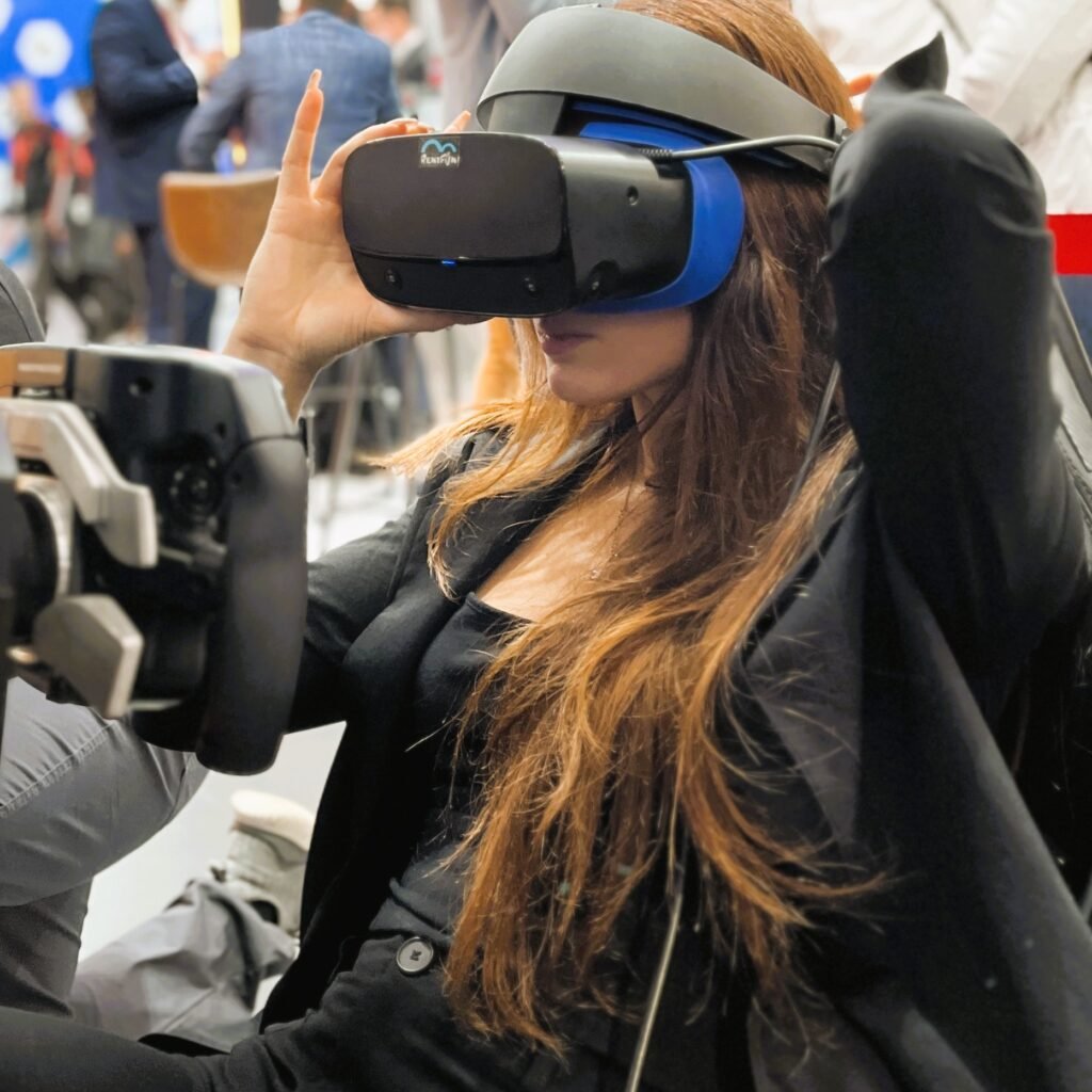 Hot Lady in VR with motion formula simulator rental in Munich.