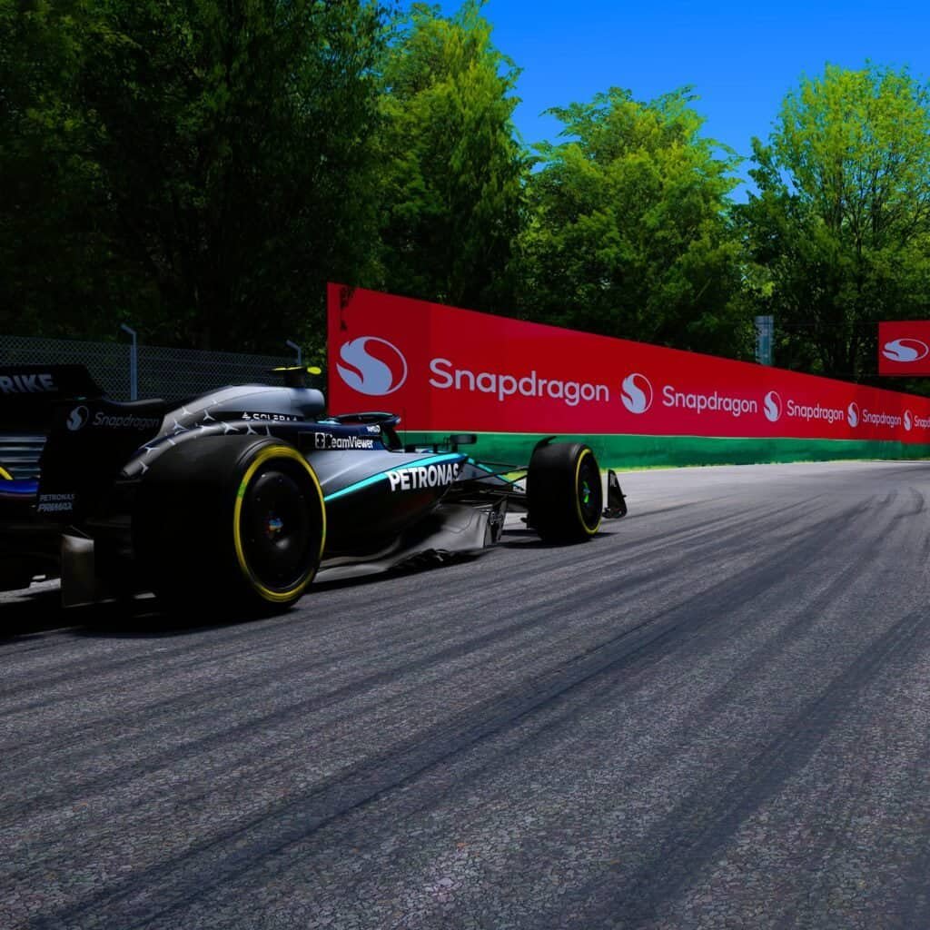 RoarFun X Snapdragon brand activation for Snapdragon Summit By Qualcomm event integrated design virtual branding on a track.